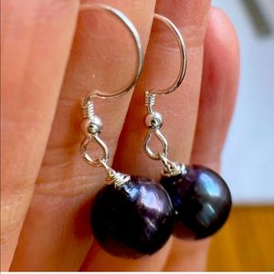 9.8 mm Cultured black pearls and 925 Sterling Silver earrings.
